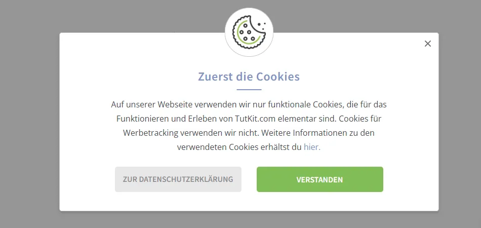 Teks kecil pada pop-up cookie di TutKit.com.