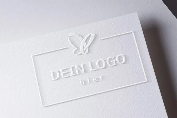 Photoshop-Mockup-skabelon til logoer: 3D-effekt i hvid på papir