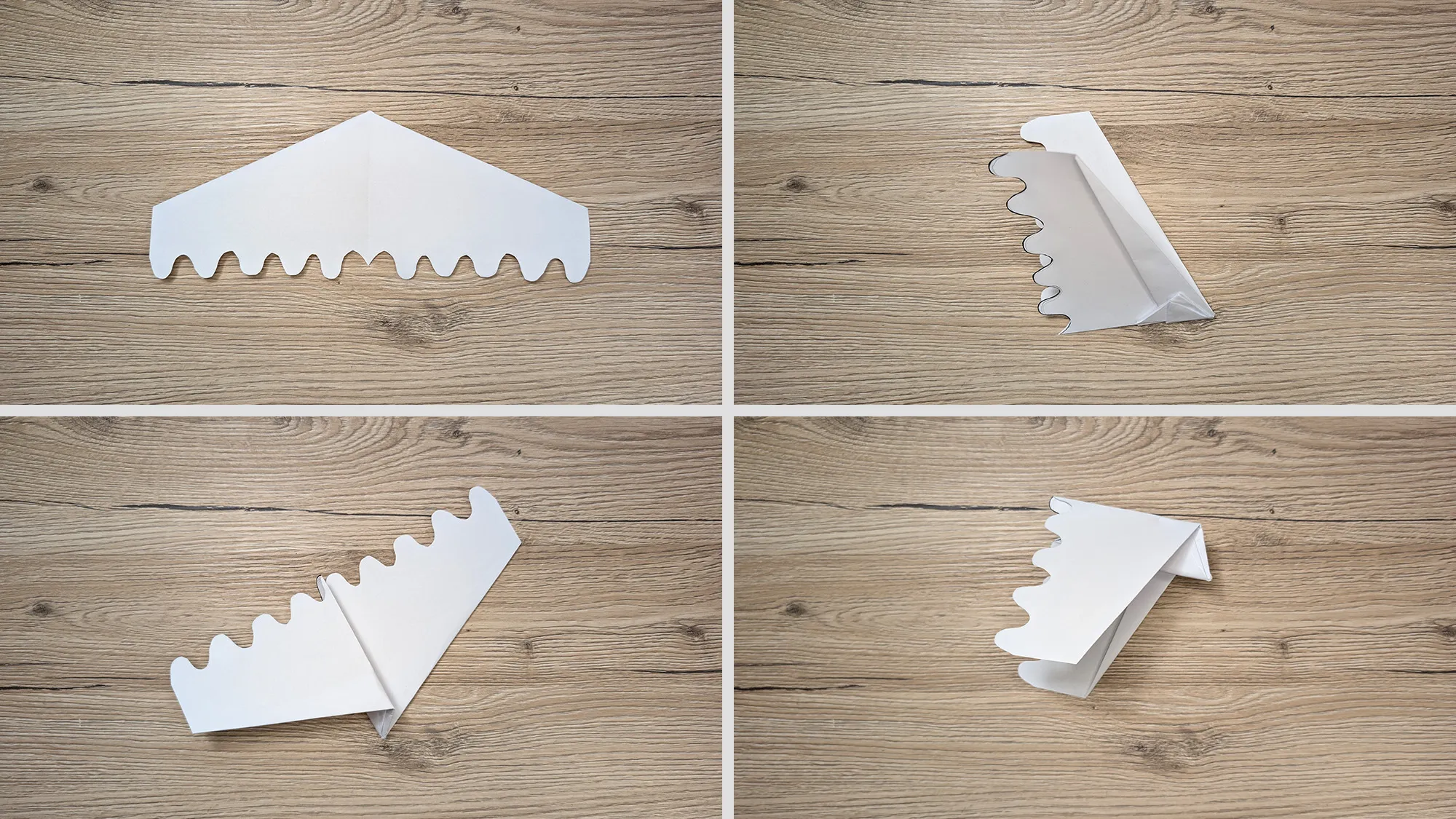 Wave Glider Papierflieger basteln Schritt 6: Flügel auseinandergeklappt, Ecken an der Nase nach innen gefaltet, Flügel nach außen gebogen