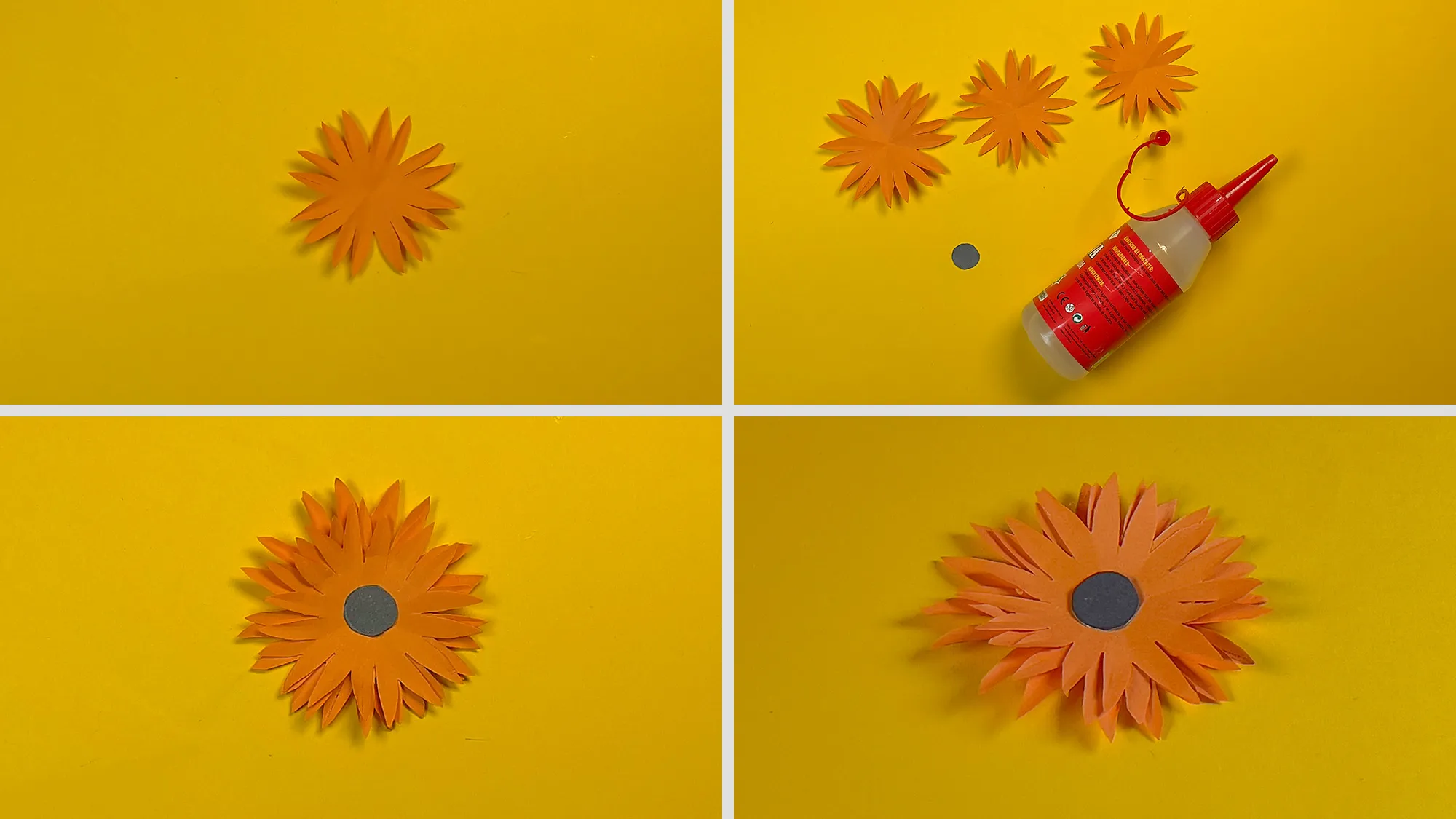 Schöne Papierblume basteln Schritt 3: Kleinere Blume aufgeklebt und mit farbigem Kreis in der Mitte verziert – fertige Papierblume