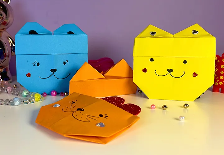 Lipatan kucing origami: Panduan dengan video, foto, dan deskripsi