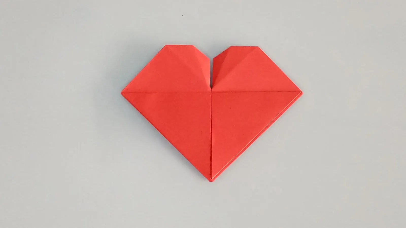 A face un inimă din hârtie prin origami, pasul 39