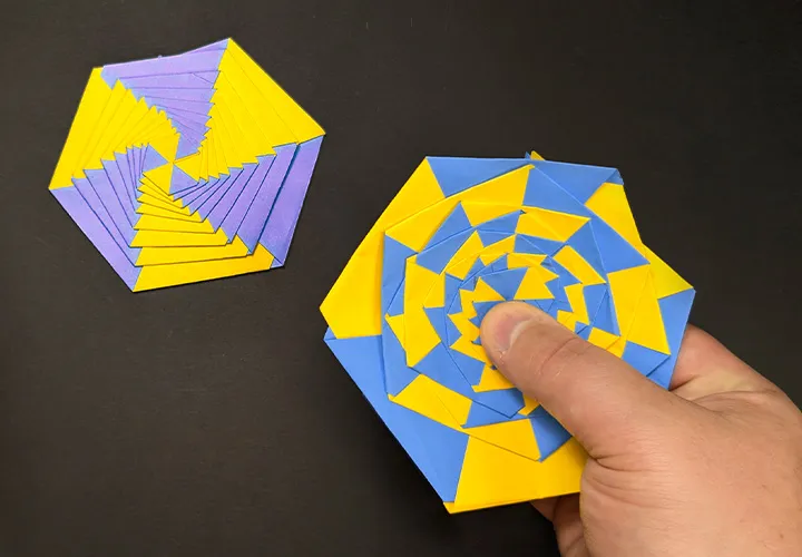 Buat mainan twist dari kertas: DIY dengan panduan video