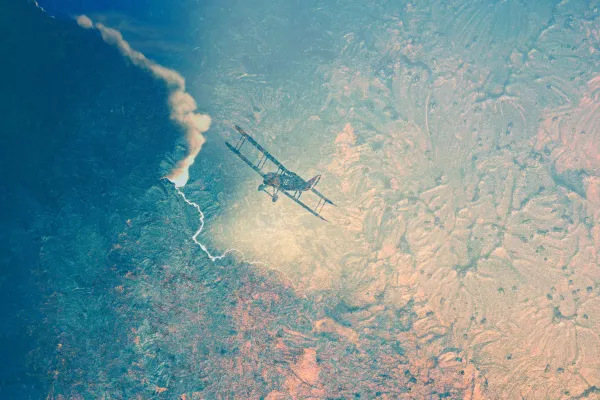 Airplane above the clouds, with acrylic and lacquer texture on top