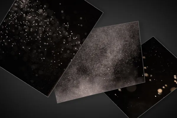 Dust, dust clouds and particles against a black background - dust images for image processing.