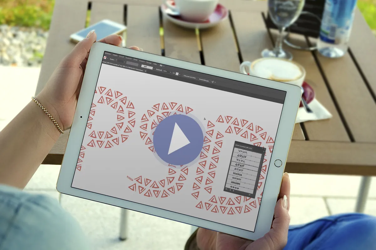 Instrukcja wideo dotycząca pędzli z ornamentami w programie Adobe Illustrator.