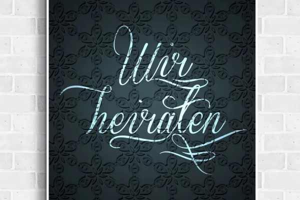 Lettering against a steel gray background with ornaments