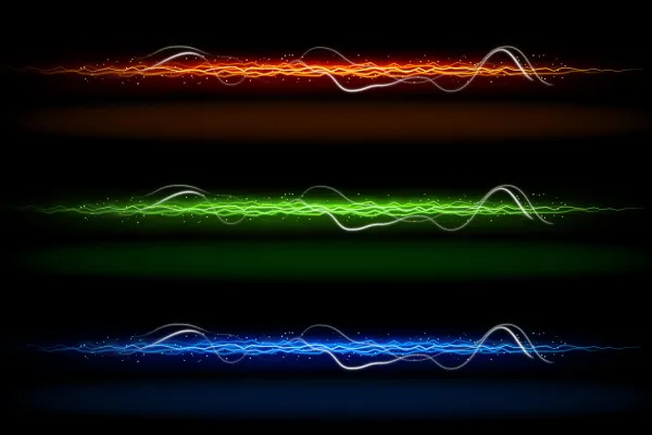 Light trails in different colors, orange, green and blue