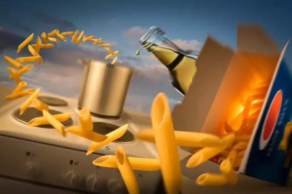 Composing with a pasta wrapper and flying noodles developed during the Adobe Photoshop tutorial