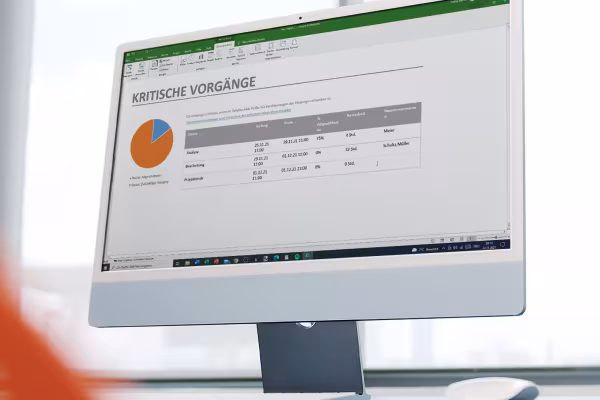Screenshot from the MS Project tutorial on one screen