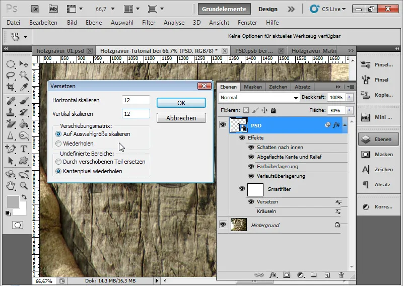 Graveringseffekt i tre for typografi og layout
