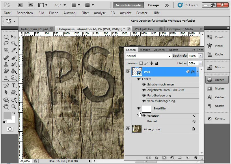 Graveringseffekt i tre for typografi og layout