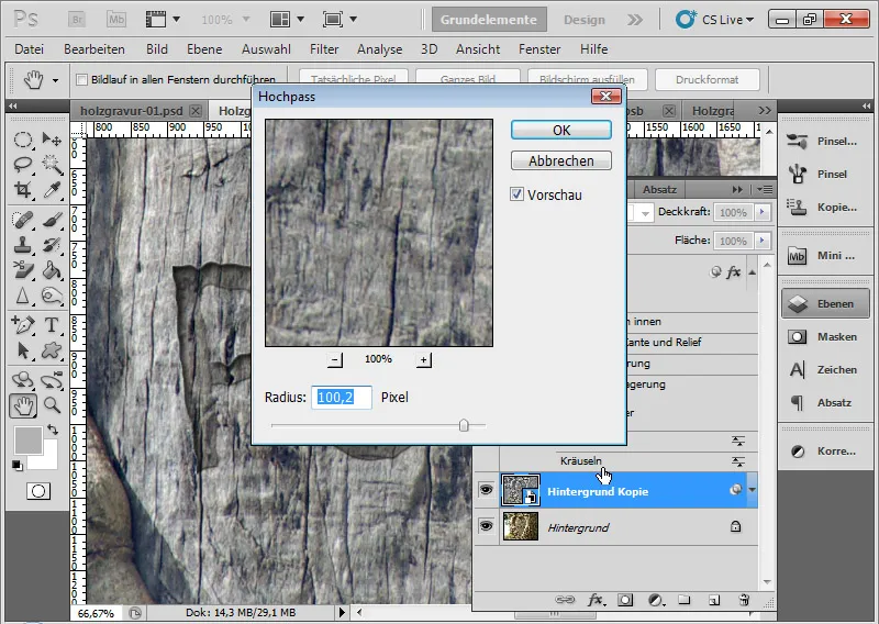 Graveringseffekt i tre for typografi og layout
