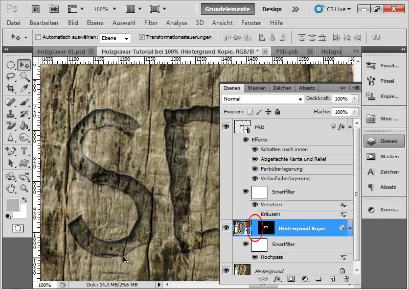 Graveringseffekt i tre for typografi og layout